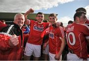 16 April 2016; Peter Kelleher and Eoin Lavers, Cork, celebrate with supporters after the game. Eirgrid GAA Football Under 21 All-Ireland Championship semi-final, Cork v Monaghan. O'Connor Park, Tullamore, Co. Offaly.  Picture credit: Sam Barnes / SPORTSFILE