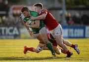 16 April 2016; Peter Robb, Connacht, is tackled by Johnny Holland and Rory Scannell, Munster. Guinness PRO12 Round 20, Connacht v Munster. Sportsground, Galway.  Picture credit: Seb Daly / SPORTSFILE