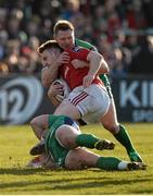 16 April 2016; Rory Scannell, Munster, is tackled by Peter Robb and Tom McCartney, Connacht. Guinness PRO12 Round 20, Connacht v Munster. Sportsground, Galway.  Picture credit: Seb Daly / SPORTSFILE