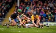 17 April 2016; John Conlon, Clare, scores his side's first goal past Kilkenny goalkeeper Eoin Murphy and Joey Holden. Allianz Hurling League Division 1 Semi-Final, Kilkenny v Clare. Semple Stadium, Thurles, Co. Tipperary. Picture credit: Stephen McCarthy / SPORTSFILE