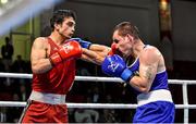 17 April 2016; Volkan Gokcek, Turkey, left, exchanges punches with David Joyce, Ireland, during their Men's Lightweight 60kg Box-Off bout. AIBA 2016 European Olympic Qualification Tournament Event. Samsun, Turkey. Photo by Sportsfile