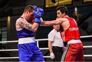 17 April 2016; Volkan Gokcek, Turkey, right, exchanges punches with David Joyce, Ireland, during their Men's Lightweight 60kg Box-Off bout. AIBA 2016 European Olympic Qualification Tournament Event. Samsun, Turkey. Photo by Sportsfile