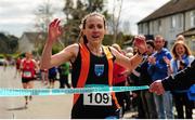 17 April 2016; Carol Costello, from Slí Cualann AC, Co. Wicklow, crosses the line to win the Master Women's relay race, during the Glo Health AAI National Road Relays. Raheny, Dublin. Picture credit : Tomás Greally / SPORTSFILE