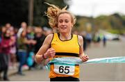 17 April 2016; Michele Finn, Leevale AC, Co. Cork, crosses the line to win the Senior Women's relay race during the Glo Health AAI National Road Relays. Raheny, Dublin. Picture credit : Tomás Greally / SPORTSFILE