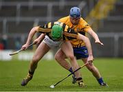 17 April 2016; Joey Holden, Kilkenny, holds both hurleys as he tries to lift the sliothar ahead of Pádraic Collins, Clare. Allianz Hurling League, Division 1, semi-final, Kilkenny v Clare. Semple Stadium, Thurles, Co. Tipperary. Picture credit: Ray McManus / SPORTSFILE