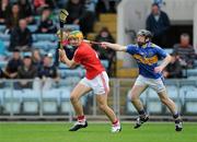28 April 2010; Dylan Stokes, Cork, in action against Liam McGrath, Tipperary. ESB GAA Munster Minor Hurling Championship Quarter-Final, Cork v Tipperary, Pairc Ui Chaoimh, Cork. Picture credit: Matt Browne / SPORTSFILE