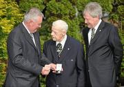 29 April 2010; Uachtarán Chumann Lúthchleas Gael Criostóir Ó Cuana, left, and GAA Ard Stiúrthóir Páraic Duffy, right, in conversation with P.S. O Riain after presenting him with a medal to mark the announcement of his retirement as Ard Comhairle delegate for Limerick. Munster Council Offices, Groody Hill, Rhebogue, Limerick. Picture credit: Diarmuid Greene / SPORTSFILE