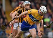17 April 2016; Patrick O'Connor, Clare, clears, under pressure from Jonjo Farrell, Kilkenny. Allianz Hurling League, Division 1, Semi-Final, Kilkenny v Clare. Semple Stadium, Thurles, Co. Tipperary. Picture credit: Ray McManus / SPORTSFILE