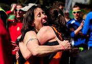 17 April 2016; Aisling Smith, left, congratulates her team mate, Carol Costello, from Slí Cualann AC, Co. Wicklow, on winning the Senior Women's relay race.  The GloHealth AAI National Road Relays. Raheny, Dublin. Picture credit: Tomás Greally /  SPORTSFILE
