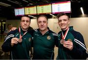 18 April 2016; Team Ireland's David Joyce, left, and Brendan Irvine, right, who won a Bronze medal at the European Olympic Boxing Qualifiers in Samsun, Turkey, with their coach Zaur Antia on their return home. Dublin Airport, Dublin. Picture credit: Cody Glenn / SPORTSFILE