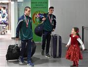 18 April 2016; Team Ireland's David Joyce, who won a Bronze medal at the European Olympic Boxing Qualifiers in Samsun, Turkey, is greeted by his daughter Rihanna, age 6, on his return home. Dublin Airport, Dublin. Picture credit: Cody Glenn / SPORTSFILE