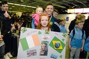 18 April 2016; Team Ireland's Brendan Irvine, who won a Bronze medal at the European Olympic Boxing Qualifiers in Samsun, Turkey, is greeted by his nieces Sophia Muldoon, age 1, and Caitlyn Muldoon, age 9, on his return home. Dublin Airport, Dublin. Picture credit: Cody Glenn / SPORTSFILE