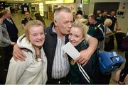 18 April 2016; Team Ireland's Christine Desmond, right, is greeted by her father Christopher and sister Rachel on her return home. Dublin Airport, Dublin. Picture credit: Cody Glenn / SPORTSFILE