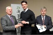 18 April 2016; Niall McKeever, UU, from Antrim, is presented with his Independent.ie Football Rising Stars Award award by Uachtarán Chumann Lúthchleas Gael Aogán Ó Fearghail, left, and Gerry Tully, Chairman of Comhairle Ardoideachais, right. Independent.ie Football Rising Stars Awards. Croke Park, Dublin. Picture credit: Seb Daly / SPORTSFILE