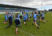 16 April 2016; Dublin players stretch following the match. Electric Ireland Leinster GAA Football Minor Championship First Round, Dublin v Offaly. Parnell Park, Dublin.  Picture credit: Cody Glenn / SPORTSFILE