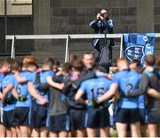 16 April 2016; Dublin supporter photographs the Dublin huddle ahead of the game. Electric Ireland Leinster GAA Football Minor Championship First Round, Dublin v Offaly. Parnell Park, Dublin. Picture credit: Cody Glenn / SPORTSFILE