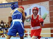 30 April 2010; Ryan Burnett, Ireland, in action against Vikas Krishan, India, during their 48 Kg bout. AIBA Youth World Championships, Baku, Azerbeijan. Picture syndicated by SPORTSFILE on behalf of the AIBA