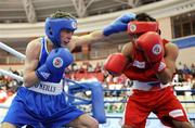 30 April 2010; Ryan Burnett, Ireland, left, in action against Mark Anthony Barriga, Philippines, during their 48 Kg bout. AIBA Youth World Championships, Baku, Azerbeijan. Picture syndicated by SPORTSFILE on behalf of the AIBA