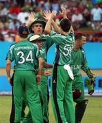 30 April 2010; Trent Johnston congratulates George Dockrell. 2010 Twenty20 Cricket World Cup Group Stages, Ireland v West Indies, Providence Stadium, Guyana. Picture credit: Handout / Barry Chambers / RSA / Cricket Ireland Via SPORTSFILE