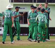 30 April 2010; Boyd Rankin is congratulated on taking the wicket of Chanderpaul. 2010 Twenty20 Cricket World Cup Group Stages, Ireland v West Indies, Providence Stadium, Guyana. Picture credit: Handout / Barry Chambers / RSA / Cricket Ireland Via SPORTSFILE