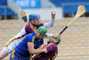 2 May 2010; Wexford goalkeeper Noel Carton collects the ball ahead of team-mate Keith Rossiter and Diarmuid McMahon, Clare. Allianz GAA Hurling National League Division 2 Final, Clare v Wexford, Semple Stadium, Thurles, Co Tipperary. Picture credit: Daire Brennan / SPORTSFILE