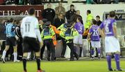 3 May 2010; Gardai intervene after Shamrock Rovers supporters halted the game for a number of minutes. Airtricity League Premier Division, Dundalk v Shamrock Rovers, Oriel Park, Dundalk. Photo by Sportsfile