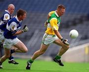 27 May 2001; Neville Coughlan of Offaly in action against Paul McDonald of Laois during the Bank of Ireland Leinster Senior Football Championship Quarter-Final match between Offaly and Laois at Croke Park in Dublin. Photo by Brendan Moran/Sportsfile