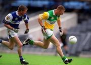 27 May 2001; Neville Coughlan of Offaly in action against Paul McDonald of Laois during the Bank of Ireland Leinster Senior Football Championship Quarter-Final match between Offaly and Laois at Croke Park in Dublin. Photo by Brendan Moran/Sportsfile