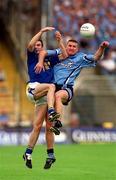 27 May 2001; Darren Homan of Dublin in action against David Hannify of Longford during the Bank of Ireland Leinster Senior Football Championship Quarter-Final match between Dublin and Longford at Croke Park in Dublin. Photo by Damien Eagers/Sportsfile