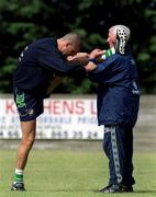 31 May 2001; Niall Quinn, left, stretches with physiotherapist Mick Byrne during a Republic of Ireland Training Session at John Hyland Park in Baldonnell, Dublin. Photo by Damien Eagers/Sportsfile