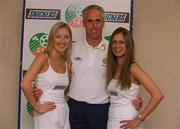 31 May 2001; Snickers, the official snack of the FAI, became Irish soccer's longest standing sponsor today, as they agree to extend their sponsorship of Irish Soccer until at least the end of the 2002 season. Pictured at the announcement are Jennifer Langan, left, Republic of Ireland manager Mick McCarthy, and Roberta Rawat at FAI HQ in Dublin. Photo by Damien Eagers/Sportsfile