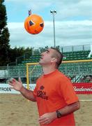 2 June 2001; Manchester United legend, former France International and France Beach Football manager Eric Cantona pictured at the launch of the Budweiser Beach Festival at Wanderers RFC in Ballsbridge, Dublin. 450 tonnes of soft sand will create a 27 x 38 metre beach, in one of Dublin's best known rugby clubs, as Budweiser plays host to Ireland's first ever European Professional Beach Soccer and Rugby Tournament. Photo by Shane O'Neill/Sportsfile