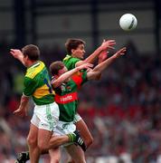 28 September 1997; Maurice Fitzgerald of Kerry fields a high ball ahead of team-mate Dara O'Cinneide, left, and James Nallen of Mayo during the Bank of Ireland All-Ireland Senior Football Championship Final between Kerry and Mayo at Croke Park in Dublin. Photo by Brendan Moran/Sportsfile