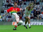 3 June 2001; Brian Lacey of Kildare attempts to stop a point of Brian Kelly of Carlow during the Bank of Ireland Leinster Senior Football Championship Quarter-Final match between Kildare and Carlow at Croke Park in Dublin. Photo by Pat Murphy/Sportsfile