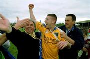 3 June 2001; Frankie Dolan of Roscommon celebrates with supporters following his side's victory in the Bank of Ireland Connacht Senior Football Championship Semi-Final match between Galway and Roscommon at Tuam Stadium in Tuam, Galway. Photo by Damien Eagers/Sportsfile