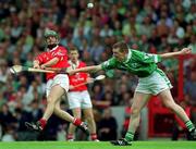 27 May 2001; Jerry O'Connor of Cork in action against Mark Foley of Limerick during the Guinness Munster Senior Hurling Championship Quarter-Final match between Cork and Limerick at Páirc Uí Chaoimh in Cork. Photo by Ray McManus/Sportsfile