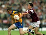 3 June 2001; Seamus O'Neill of Roscommon is tackled by Joe Bergin of Galway during the Bank of Ireland Connacht Senior Football Championship Semi-Final match between Galway and Roscommon at Tuam Stadium in Tuam, Galway. Photo by Damien Eagers/Sportsfile