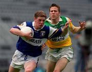 27 May 2001; Brian McDonald of Laois in action against Karl Slattery of Offaly during the Bank of Ireland Leinster Senior Football Championship Quarter-Final match between Offaly and Laois at Croke Park in Dublin. Photo by Brendan Moran/Sportsfile