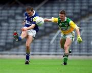 27 May 2001; Chris Conway of Laois in action against Cathal Daly of Offaly during the Bank of Ireland Leinster Senior Football Championship Quarter-Final match between Offaly and Laois at Croke Park in Dublin. Photo by Brendan Moran/Sportsfile