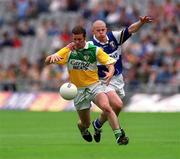 27 May 2001; Gary Comerford of Offaly in action against Pauric Leonard of Laois during the Bank of Ireland Leinster Senior Football Championship Quarter-Final match between Offaly and Laois at Croke Park in Dublin. Photo by Brendan Moran/Sportsfile