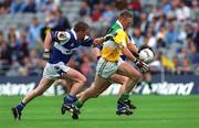 27 May 2001; Vinny Claffey of Offaly in action against Paul McDonald of Laois during the Bank of Ireland Leinster Senior Football Championship Quarter-Final match between Offaly and Laois at Croke Park in Dublin. Photo by Brendan Moran/Sportsfile