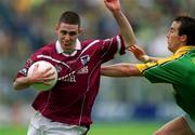 3 June 2001; Fergal Wilson of Westmeath is tackled by Anthony Moyles of Meath during the Bank of Ireland Leinster Senior Football Championship Quarter-Final match between Meath and Westmeath at Croke Park in Dublin. Photo by David Maher/Sportsfile