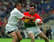3 June 2001; Johnny Nevin of Carlow is tackled by Kenny Duane of Kildare during the Bank of Ireland Leinster Senior Football Championship Quarter-Final match between Kildare and Carlow at Croke Park in Dublin. Photo by David Maher/Sportsfile