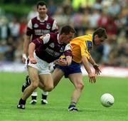 3 June 2001; Paul Noone of Roscommon in action against Sean Og De Paor of Galway during the Bank of Ireland Connacht Senior Football Championship Semi-Final match between Galway and Roscommon at Tuam Stadium in Tuam, Galway. Photo by Damien Eagers/Sportsfile