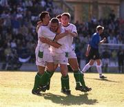 6 June 2001; Richard Dunne, centre, of Republic of Ireland celebrates after scoring his side's first goal, with team-mates Ian Harte, left, and Matt Holland, during the FIFA World Cup 2002 Group 2 Qualifier match between Estonia and Republic of Ireland at Lillekula Stadium in Tallinn, Estonia. Photo by David Maher/Sportsfile
