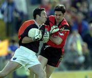 9 June 2001; Paul Hearty of Armagh is tackled by Shane Mulholland of Down during the Bank of Ireland All-Ireland Senior Football Championship Qualifier Round 1 match between Down and Armagh at Casement Park in Belfast. Photo by Ray McManus/Sportsfile