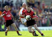 9 June 2001; Brendan Coulter of Down in action against Gerard Reid of Armagh during the Bank of Ireland All-Ireland Senior Football Championship Qualifier Round 1 match between Down and Armagh at Casement Park in Belfast. Photo by Ray McManus/Sportsfile