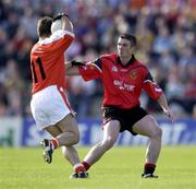 9 June 2001; Barry O'Hagan of Armagh in action against Liam Doyle of Down during the Bank of Ireland All-Ireland Senior Football Championship Qualifier Round 1 match between Down and Armagh at Casement Park in Belfast. Photo by Ray McManus/Sportsfile