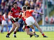 9 June 2001; Michael Walsh of Down in action against Andrew McCann of Armagh during the Bank of Ireland All-Ireland Senior Football Championship Qualifier Round 1 match between Down and Armagh at Casement Park in Belfast. Photo by Ray McManus/Sportsfile