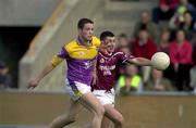 9 June 2001; Robert Mageean of Wexford in a race for possession with Joe Fallon of Westmeath during the Bank of Ireland All-Ireland Senior Football Championship Qualifier Round 1 match between Wexford and Westmeath at Wexford Park in Wexford. Photo by Brendan Moran/Sportsfile